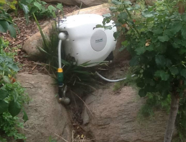 Hoselink Retractable Reel Mounted on to rock